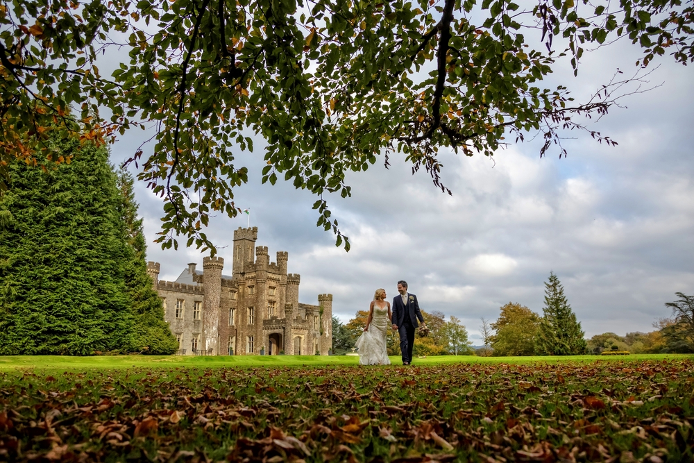 Bride and Groom infront of castle