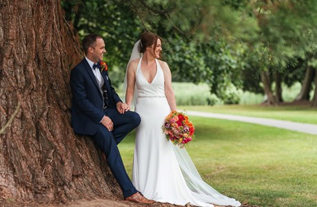 Wedding couple by tree