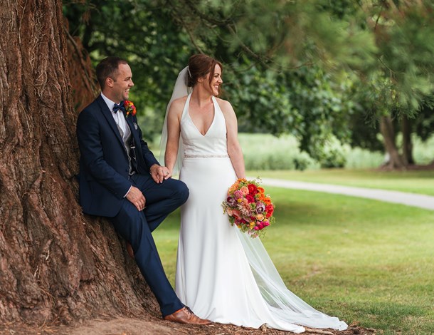 Wedding couple by tree