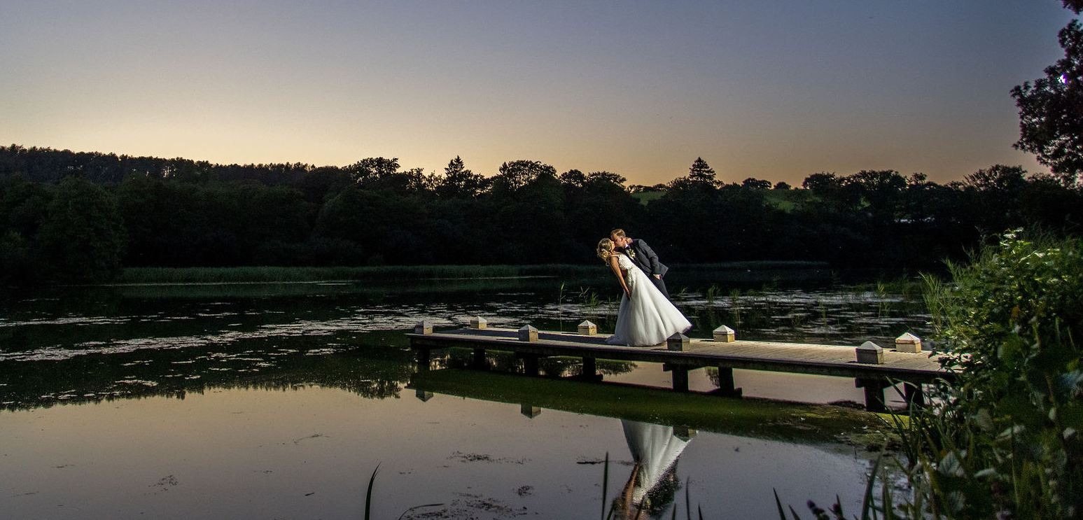 Couple on lake at sunset