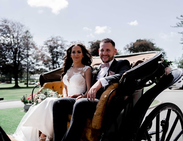Couple in carriage